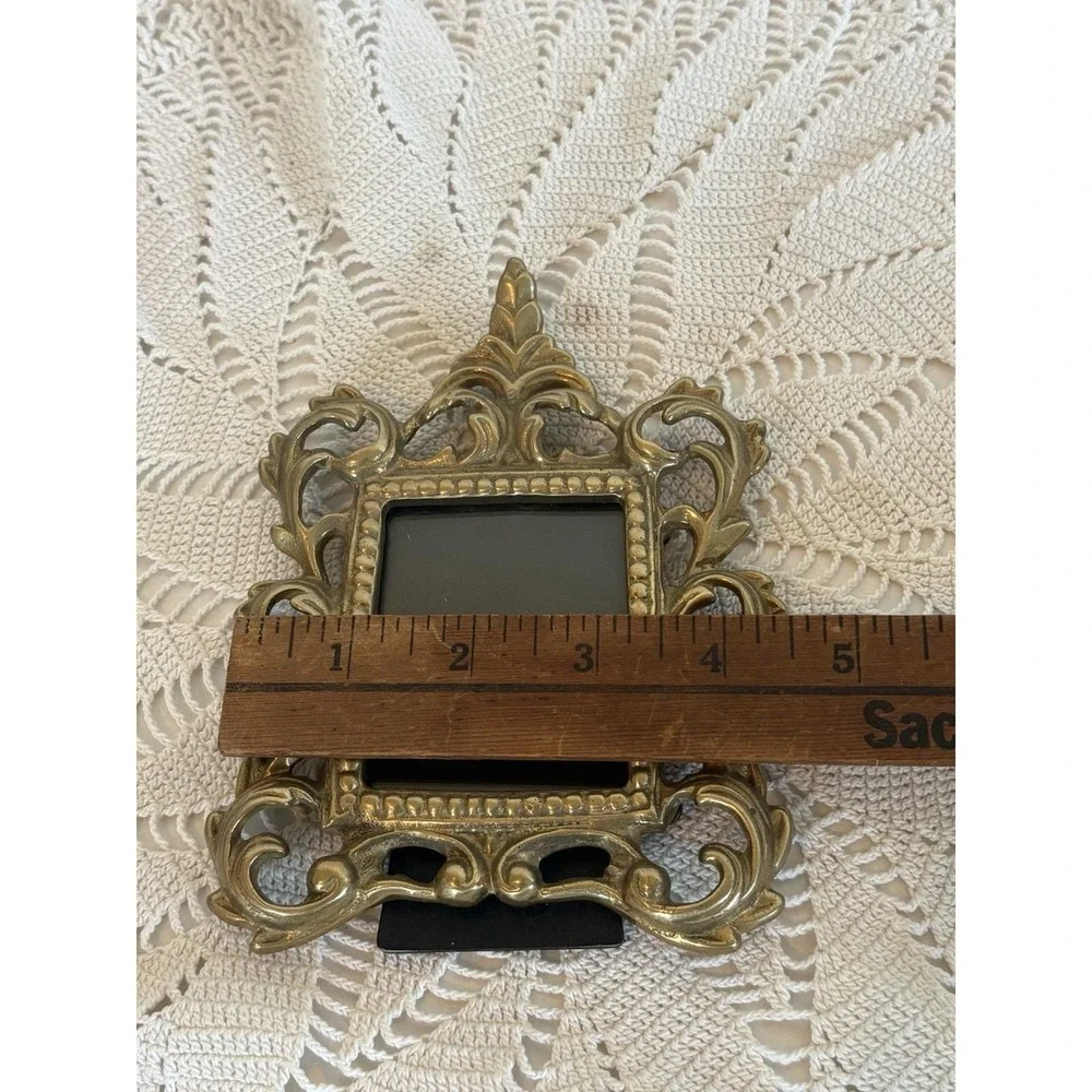 vintage brass picture frame Ornate rococo-style scrollwork Design. 2.5x3.5.